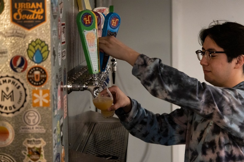 <strong>Bartender Ben Armstrong pours a beer at Hampline Brewing, which is celebrating its first anniversary Saturday, March 26.</strong> (Brad Vest/Special to the Daily Memphian)