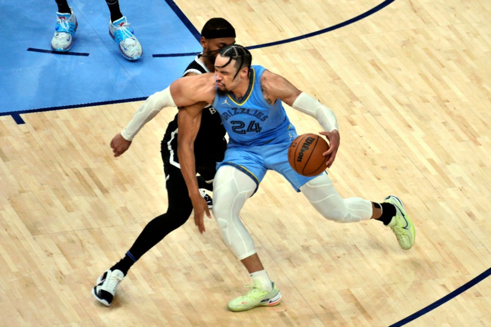 <strong>Memphis Grizzlies forward Dillon Brooks (24) works against Brooklyn Nets forward Bruce Brown</strong>&nbsp;<strong>on March 23, 2022, at FedExForum.</strong> (Brandon Dill/AP)