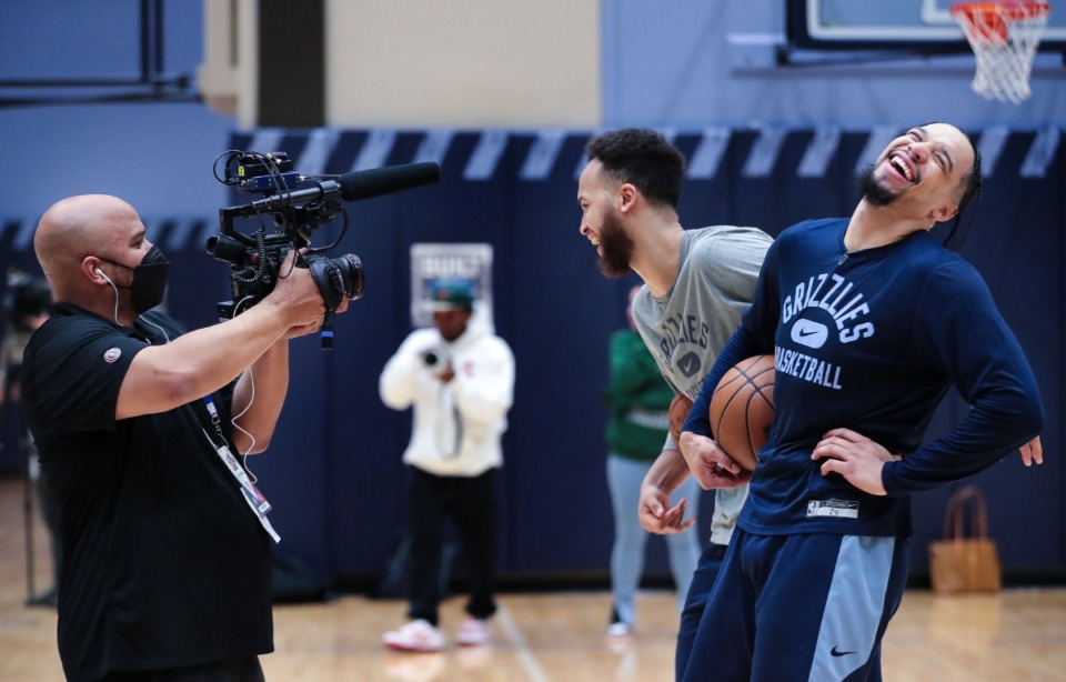 <strong>Memphis Grizzlies forward Kyle Anderson makes his teammate Dillon Brooks laugh during an ESPN interview at a March 22, 2022 practice at FedExForum.</strong> (Patrick Lantrip/Daily Memphian)