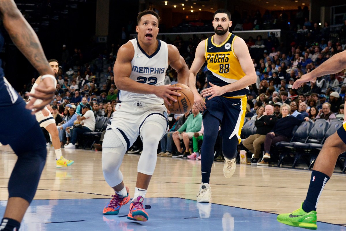 <strong>Memphis Grizzlies guard Desmond Bane (22) drives ahead of Indiana Pacers center Goga Bitadze (88)&nbsp;on March 24, 2022, at FedExForum.</strong> (Brandon Dill/AP)