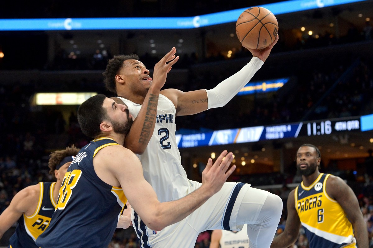 <strong>Memphis Grizzlies center Xavier Tillman Sr. (2) shoots against Indiana Pacers center Goga Bitadze (88)&nbsp;on March 24, 2022, at FedExForum.</strong> (Brandon Dill/AP)