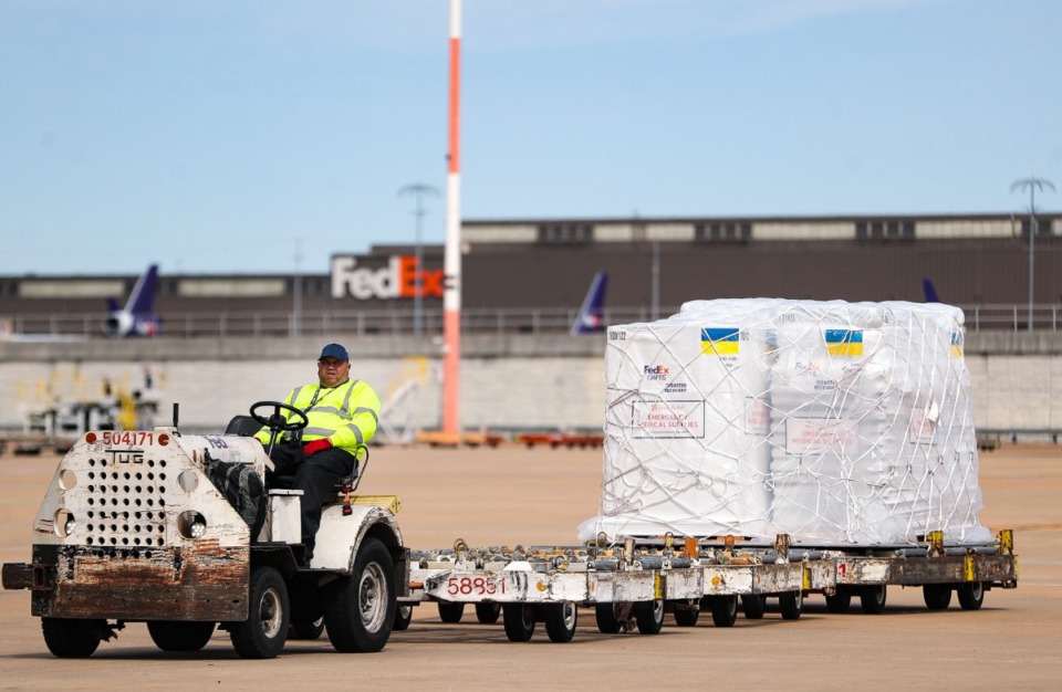 <strong>A FedEx employee waits to load cargo into the plane. </strong><strong>The United Nations&nbsp;estimates that 10 million people&nbsp;have fled their homes in Ukraine since the outset of the war.&nbsp;</strong>(Patrick Lantrip/The Daily Memphian)