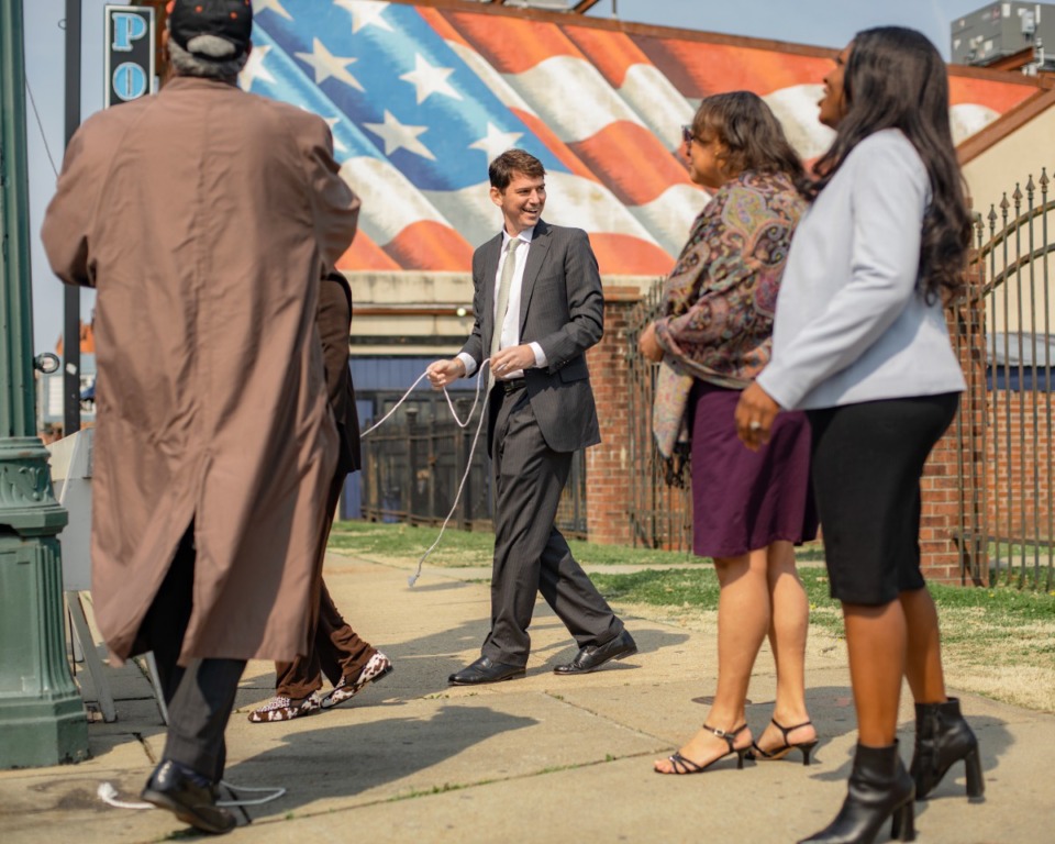 <strong>Memphis City Councilman Worth Morgan (center) helps with the unveiling of the Ida B. Wells street sign.</strong> (Houston Cofield/Special To The Daily Memphian)