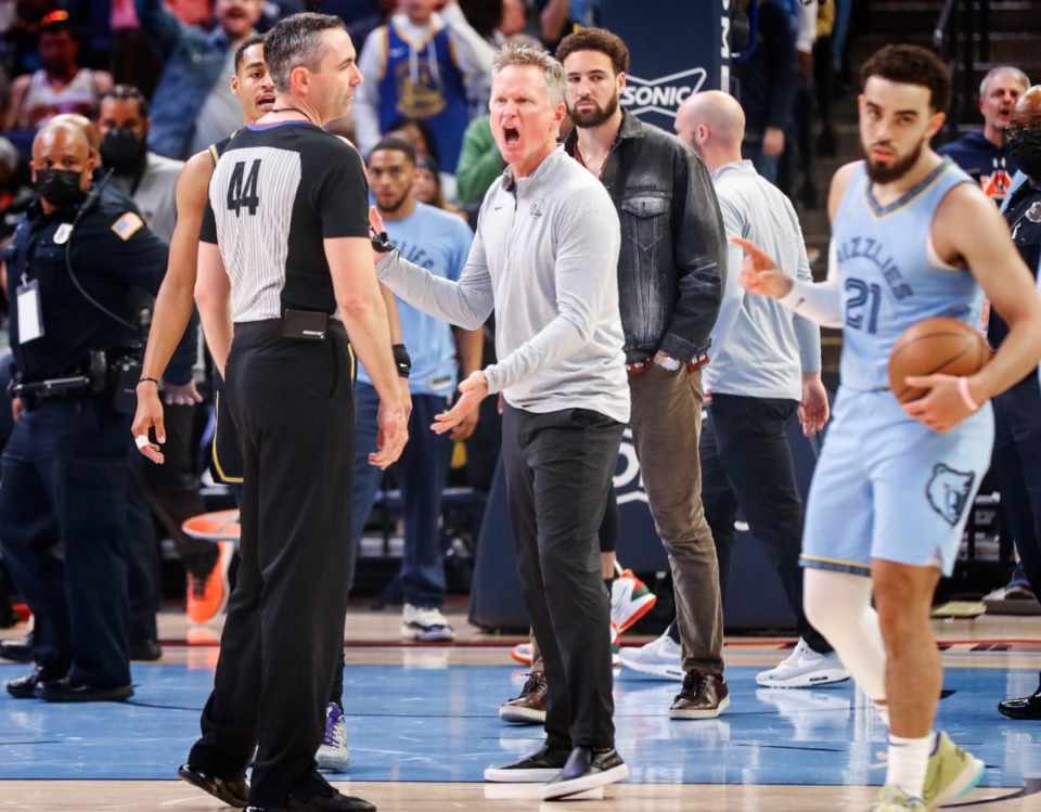 <strong>Golden State Warriors head coach Steve Kerr (middle) screams at an official while being ejected from a game against the Memphis Grizzlies&nbsp;on March 28, 2022, at FedExForum.</strong> (Mark Weber/The Daily Memphian)
