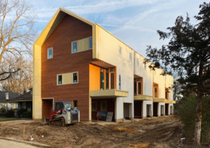 <strong>The first set of townhomes on Jefferson are still under construction. They offer four homes with flexible space underneath that can be used for cars, an extra room or a patio.</strong> (Photo courtesy of brg3s)