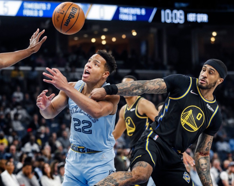 <strong>Memphis Grizzlies guard Desmond Bane (left) loses the ball while driving the lane against Golden State Warriors defender Gary Payton II (right)&nbsp;on March 28, 2022, at FedExForum.</strong> (Mark Weber/The Daily Memphian)