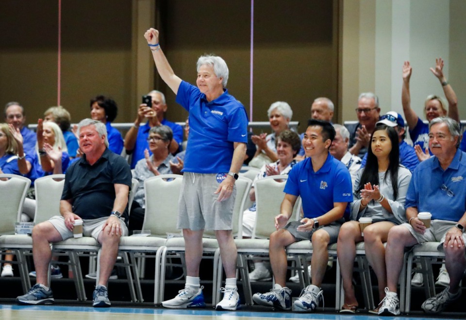 <strong>Memphis fan Harold Byrd (middle) celebrates during a Tigers 107-77 victory over Raw Talent Elite during their exhibition game in Nassau, Bahamas, Sunday, August 18, 2019.</strong> (Mark Weber/Daily Memphian file)