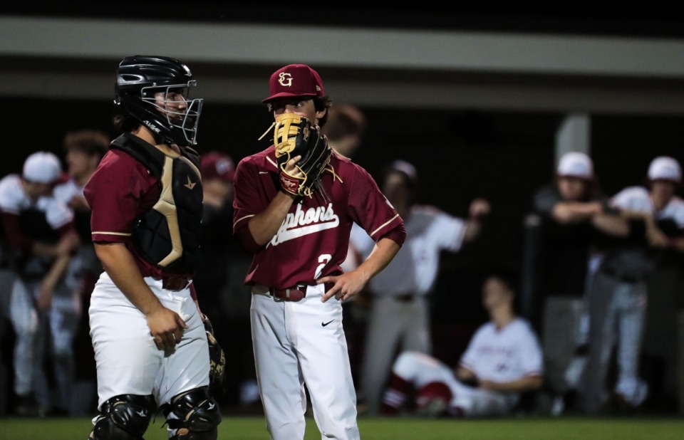 <strong>St.George's pitcher Jake Seward (2) talks with his catcher during the game against ECS on March 29.</strong> (Patrick Lantrip/Daily Memphian)