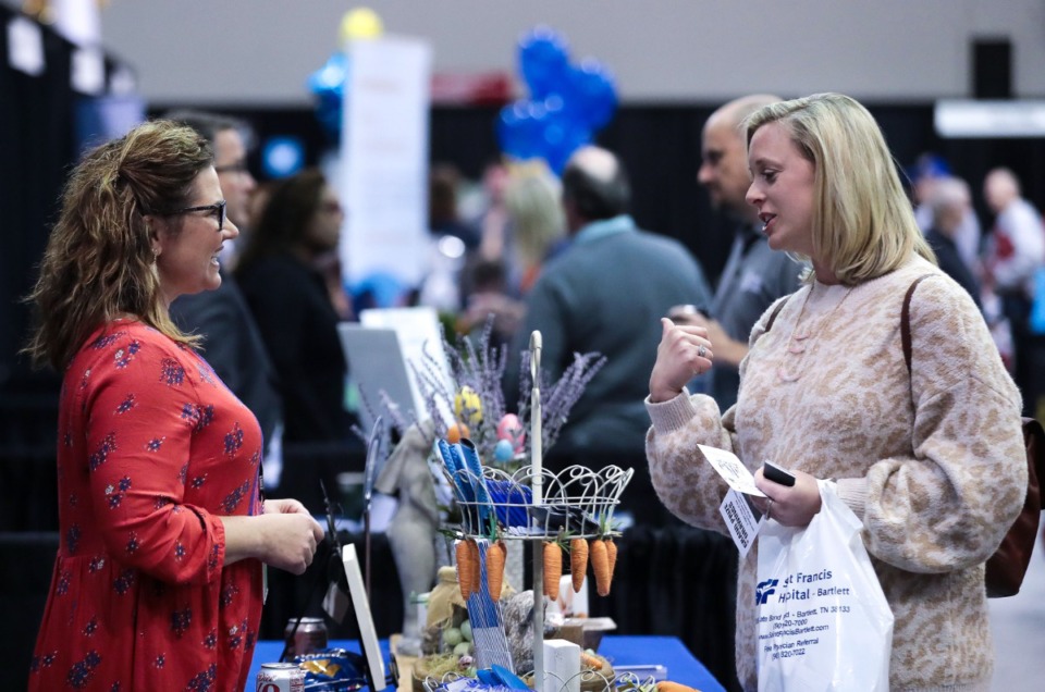 <strong>Julie Trayal (left) with Ave Maria talks with Shelly Boaz during the Bartlett Business Expo held at the Bartlett Recreation Center on March 31, 2022.</strong> (Patrick Lantrip/Daily Memphian)