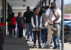 <strong>Dozens of Memphians wait in line outside the Shelby County Clerk's Poplar Plaza branch on Friday, April 1, 2022.</strong> (Patrick Lantrip/Daily Memphian)