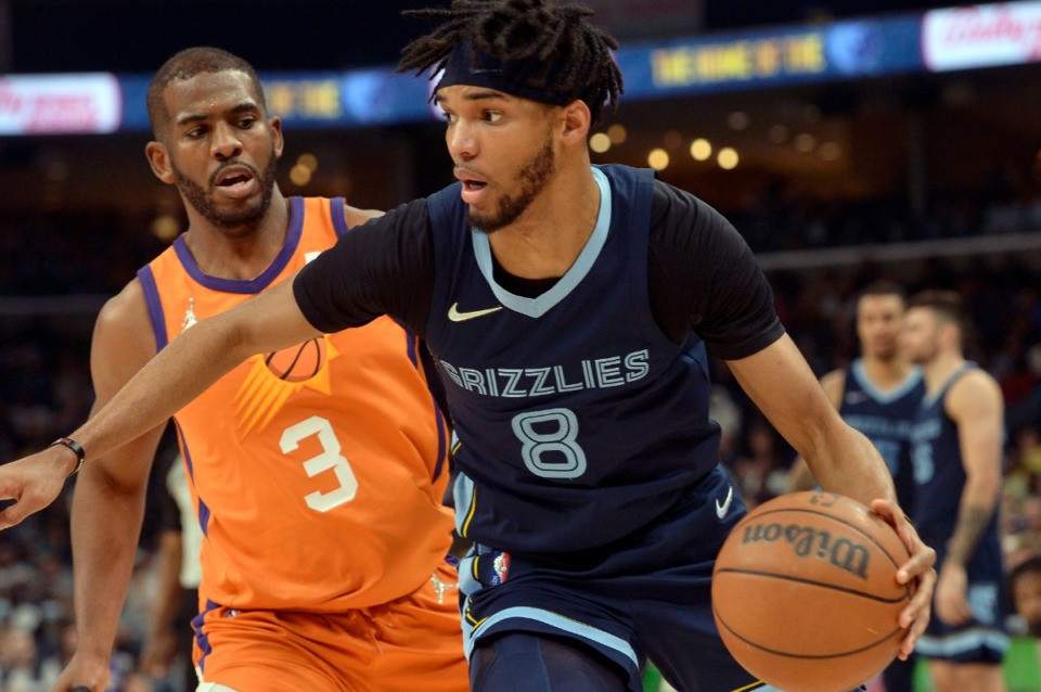 <strong>Memphis Grizzlies guard Ziaire Williams (8) charges ahead of Phoenix Suns guard Chris Paul (3) on April 1, 2022, at FedExForum.</strong> (Brandon Dill/AP)