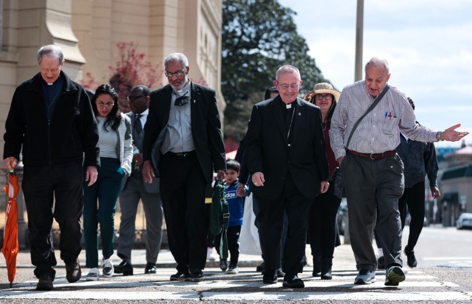 <strong>Bishop David Talley (second from right) walks Saturday from St. Peter Catholic Church to the National Civil Rights Museum during an Interfaith Prayer Service and Walk.</strong> (Patrick Lantrip/Daily Memphian)