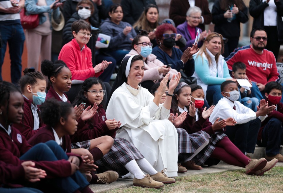 <strong>Sister Anna Joy and children from St. Paul Catholic School in Whitehaven listen during the PrayWalk that concluded at the National Civil Rights Museum at 450 Mulberry St.</strong>&nbsp;(Patrick Lantrip/Daily Memphian)