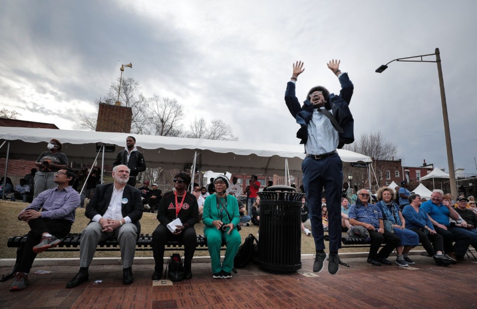 <strong>Justin Pearson jumps up and down in celebration during a musical tribute to Dr. Martin Luther King Jr. at the National Civil Rights Museum on April 4.</strong> (Patrick Lantrip/Daily Memphian)