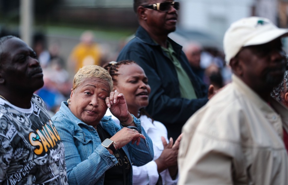 <strong>Sheryl Givens wipes a tear from her eye at the National Civil Rights Museum during a program honoring Dr. Martin Luther King Jr. on the 54th anniversary of his death.</strong> (Patrick Lantrip/Daily Memphian)