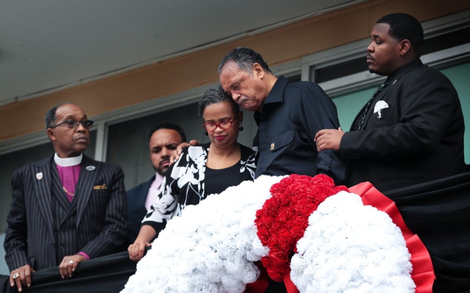 <strong>Rev. Jesse Jackson helps hang a wreath on April 4, 2022 at the location where Dr. Martin Luther King Jr. was shot and killed at the Loraine Motel on the same date 54 years ago.</strong> (Patrick Lantrip/Daily Memphian)