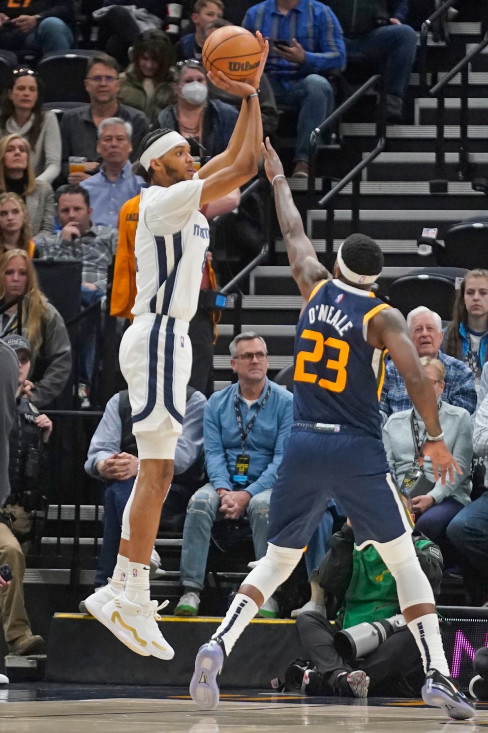 <strong>Memphis Grizzlies guard Ziaire Williams, left, shoots over Utah Jazz forward Royce O'Neale (23) on April 5 in Salt Lake City.</strong> (Rick Bowmer/AP)