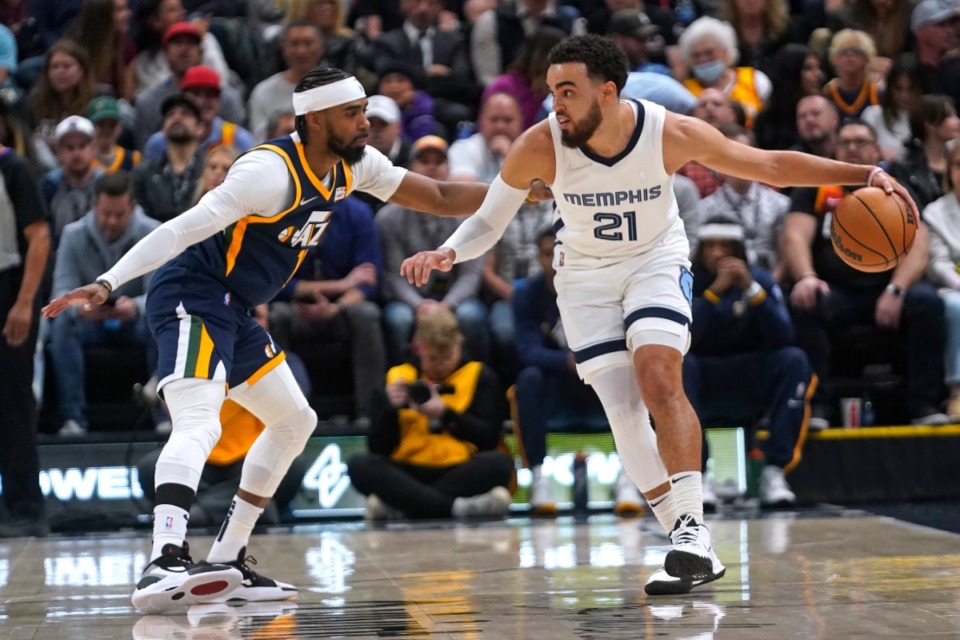 <strong>Utah Jazz guard (and former Grizzly) Mike Conley, left, defends against Memphis Grizzlies guard Tyus Jones (21) on April 5, 2022, in Salt Lake City.</strong> (Rick Bowmer/AP)