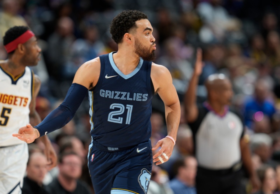<strong>Memphis Grizzlies guard Tyus Jones reacts after hitting a 3-point basket against the Denver Nuggets on April 7 in Denver.</strong> (David Zalubowski/AP)