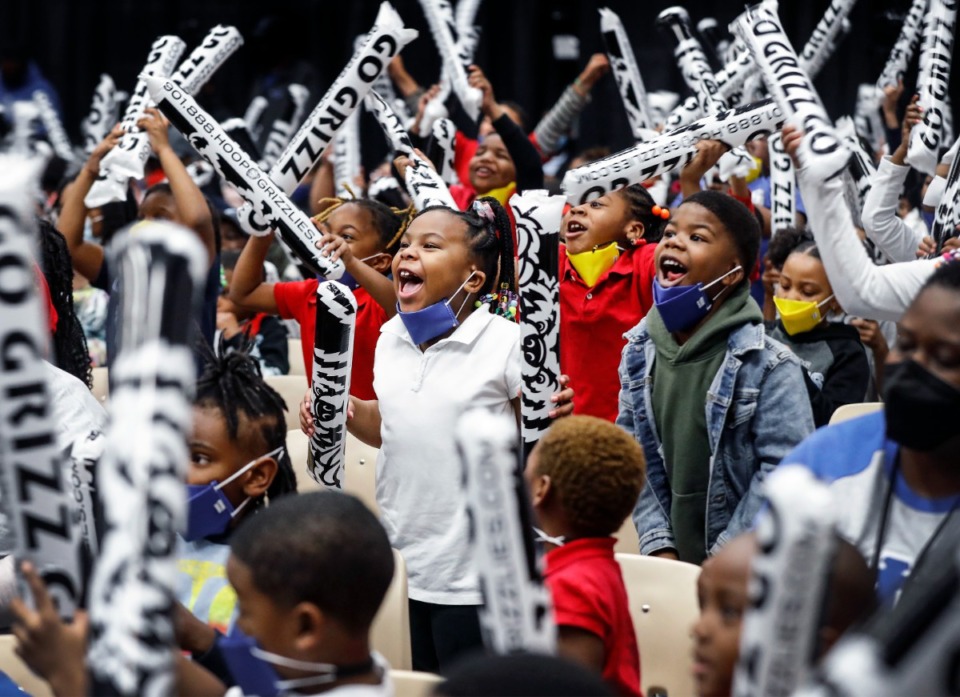 <strong>Rozelle Elementary School students cheer as the Memphis Grizzlies unveiled new spaces around the school, including a dance studio, an outside basketball court and a green space on Friday, April 8.</strong> (Mark Weber/The Daily Memphian)