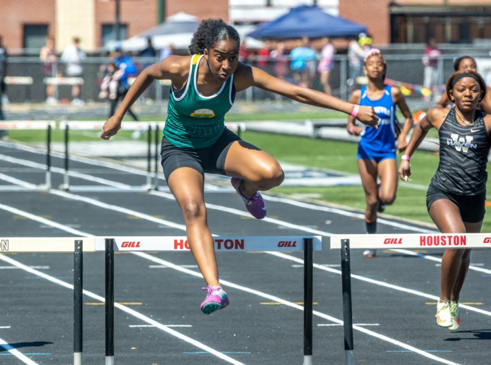 <strong>Laci Johnson of Central High School wins the 300 meter hurdles at the Houston Track &amp; Field Classic Saturday, April 9, 2022, at Houston High School.</strong> (Greg Campbell/Special to The Daily Memphian)