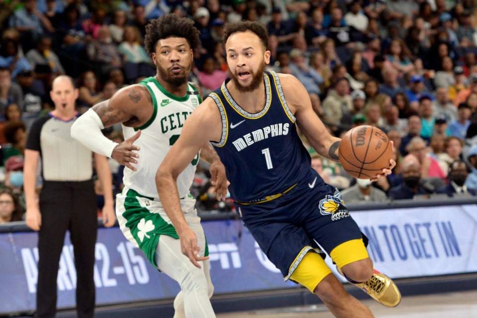 <strong>Memphis Grizzlies forward Kyle Anderson (1) handles the ball ahead of Boston Celtics guard Marcus Smart (36) in the first half of an NBA basketball game Sunday, April 10, 2022, at FedExForum.</strong> (AP Photo/Brandon Dill)