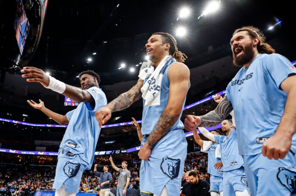 Memphis Grizzlies teammates (left to right) Jaren Jackson Jr., Brandon Clarke and Steven Adams celebrate on the bench during action against the New Orleans Pelicans on Saturday, April 9, 2022. (Mark Weber/The Daily Memphian)