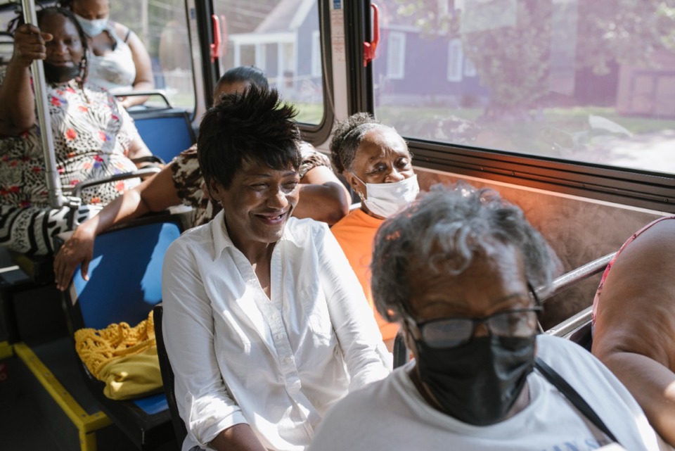 <strong>MATA customers chat on the bus on the way to the Downtown Farmers Market in 2021.</strong> (Lucy Garrett/Daily Memphian file)