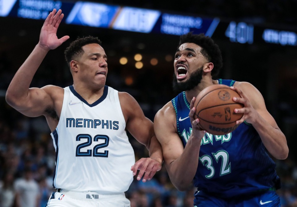 <strong>Memphis Grizzlies guard Desmond Bane (22) guards Karl Anthony-Towns (32) during an Apr. 16, 2022 playoff game against the Minnesota Timberwolves.</strong> (Patrick Lantrip/Daily Memphian)