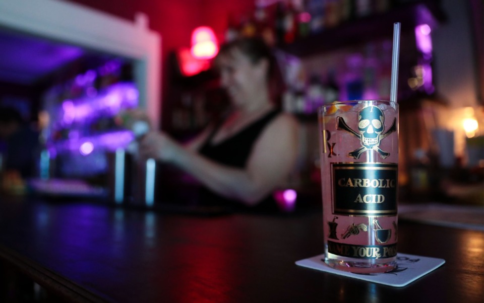 <strong>Amanda Hicks makes a cocktail at Memphis Whistle, located in Cooper-Young.</strong> (Patrick Lantrip/Daily Memphian)
