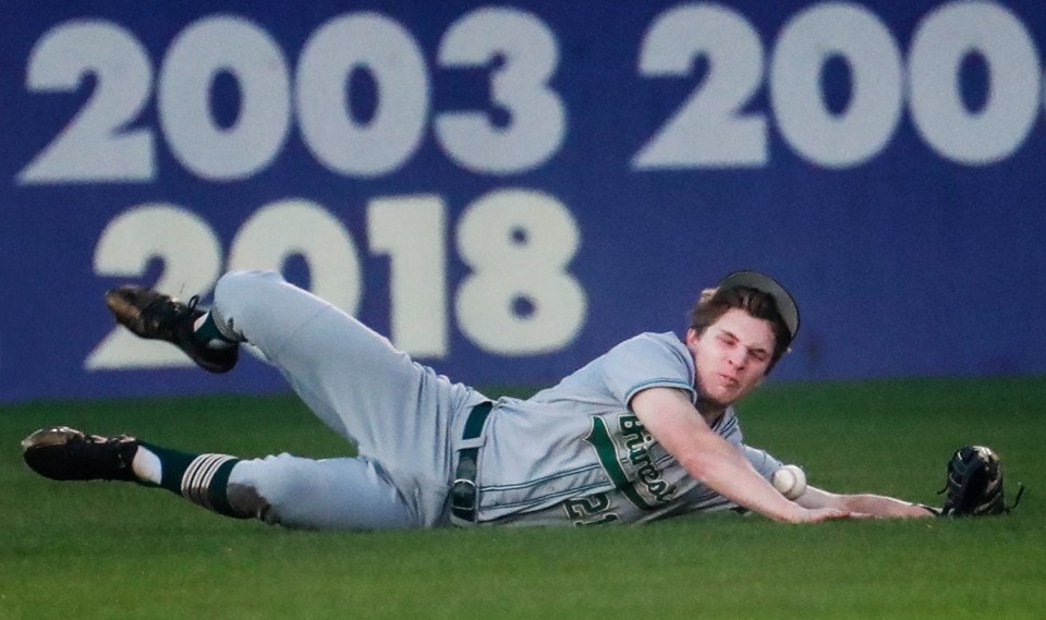 <strong>Briarcrest centerfielder Joshua Russell fails to hang onto the ball in the game against CBHS on Monday, April 18, 2022.</strong> (Mark Weber/The Daily Memphian)