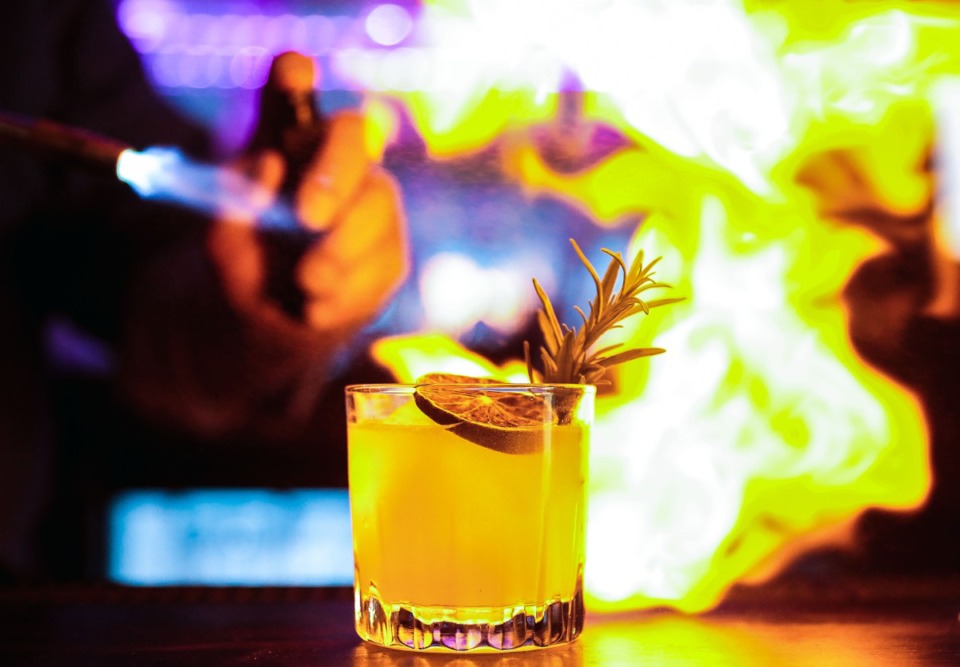 <strong>A flaming cocktail is ready for a customer at Memphis Whistle.</strong> (Patrick Lantrip/Daily Memphian)