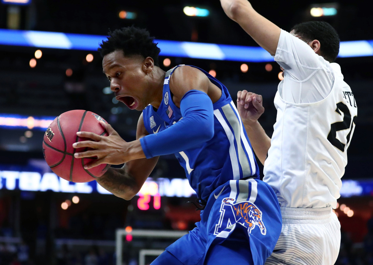<strong>University of Memphis guard Tyler Harris (1) snatches the ball before it goes out of bounds&nbsp;</strong><span class="s1"><strong>during an AAC tournament game against UCF on Friday, March 15, 2019, at FedExForum in Memphis. </strong>(Houston Cofield/Daily Memphian)</span>