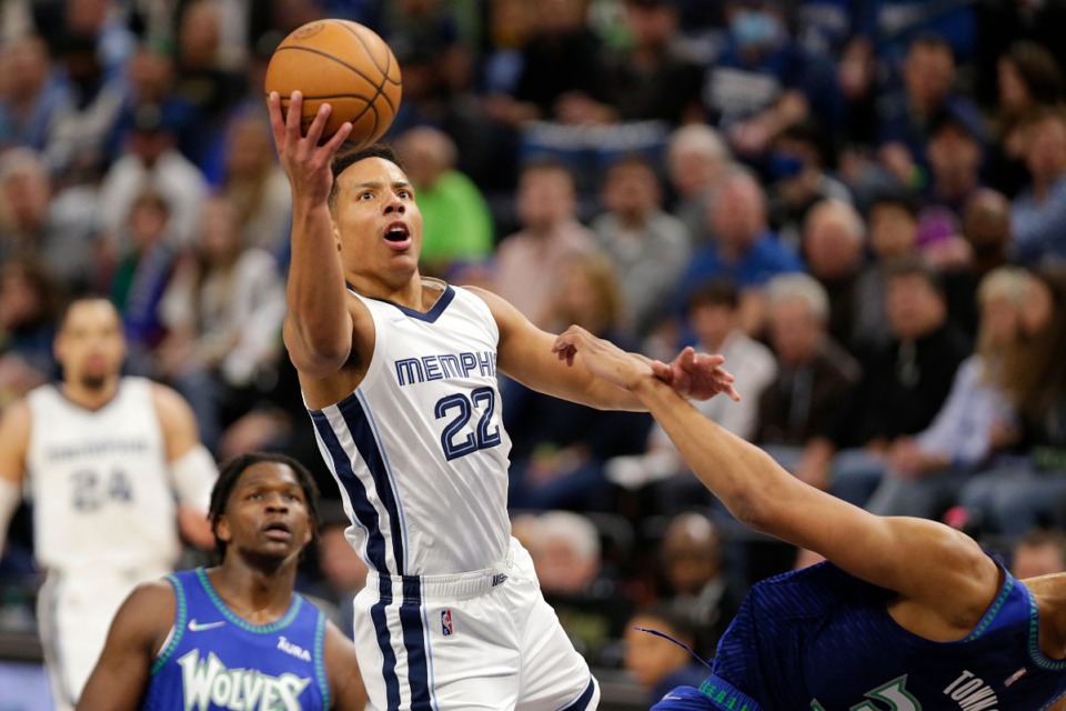 <strong>Memphis Grizzlies guard Desmond Bane (22) shoots as Minnesota Timberwolves center Karl-Anthony Towns, right, defends and forward Anthony Edwards watches on April 21, 2022, in Minneapolis.</strong> (Andy Clayton-King/AP)