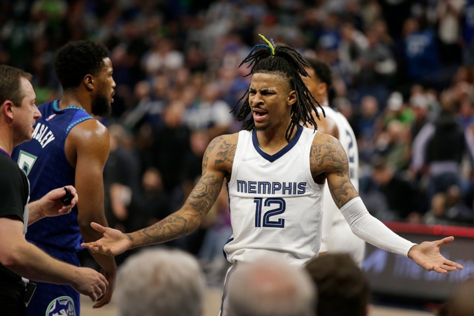 <strong>Memphis Grizzlies guard Ja Morant argues a call with referee Scott Twardoski in the game against the Minnesota Timberwolves on Thursday, April 21, 2022, in Minneapolis.</strong> (Andy Clayton-King/AP)