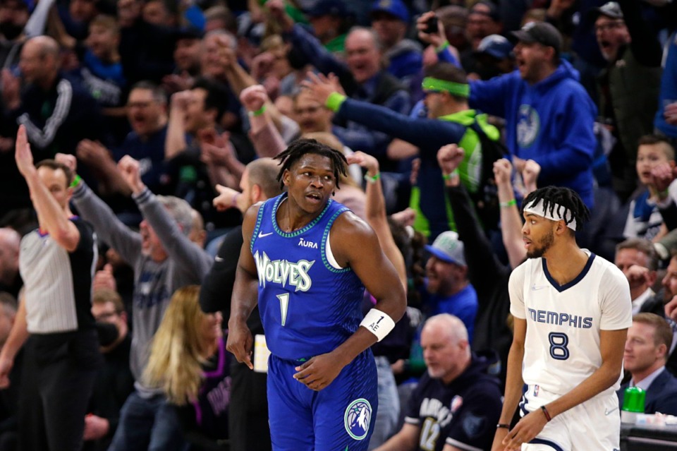 <strong>Minnesota Timberwolves fans make a lot of noise over a 3-point basket by forward Anthony Edwards (1) against Ziaire Williams (8) and the Memphis Grizzlies on April 21, 2022, in Minneapolis. </strong>(Andy Clayton-King/AP)