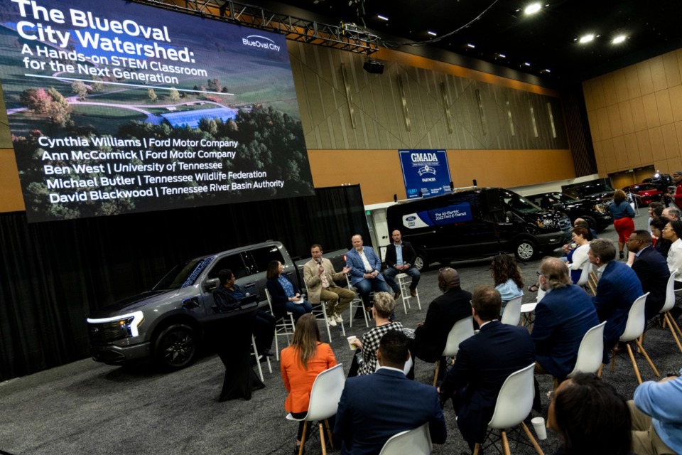 <strong>People gather to listen during the Ford Motor Co. Earth Day panel discussion, &ldquo;The Blue Oval City Watershed: A Hands-On STEM Classroom for the Next Generation&rdquo; during the Memphis International Auto Show.</strong> (Brad Vest/Special To The Daily Memphian)