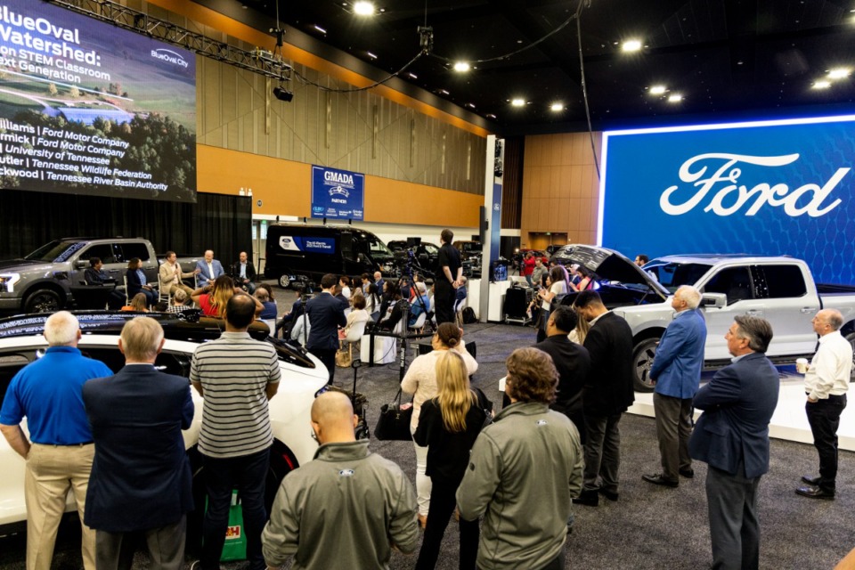 <strong>People gather to listen during the Ford Motor Co. Earth Day panel discussion, &ldquo;The Blue Oval City Watershed: A Hands-On STEM Classroom for the Next Generation&rdquo; during the Memphis Auto Show.</strong> (Brad Vest/Special To The Daily Memphian)
