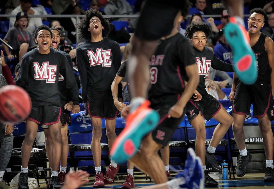 <strong>The East bench celebrates as James Wiseman dunks the ball during East High School's TSSAA Class AAA semifinal game against Brentwood at MTSU in Murfreesboro on March 15, 2019.</strong> (Jim Weber/Daily Memphian)