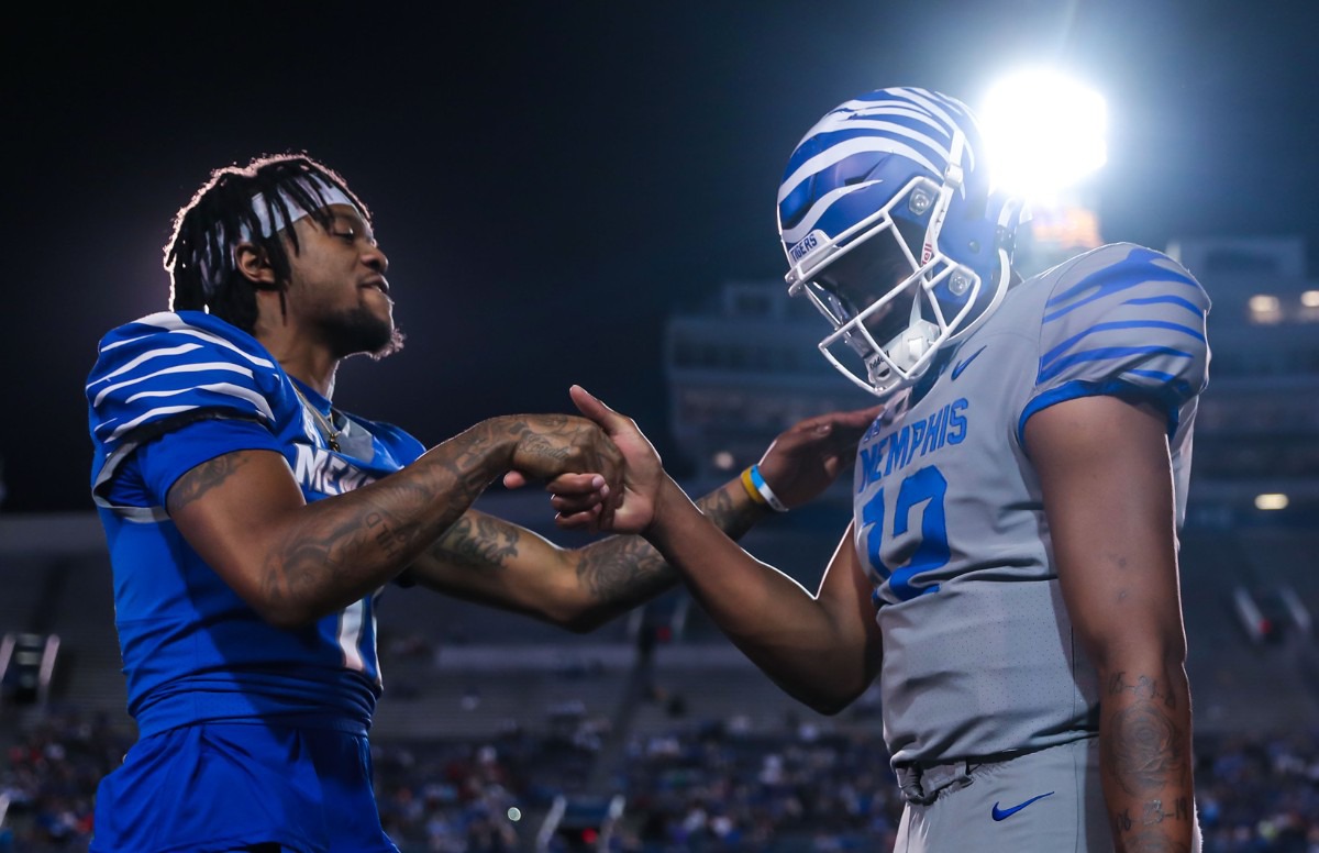 <strong>University of Memphis wide receiver Joseph Scates (11) congratulates quarterback Tevin Carter (12) after a long touchdown pass at the Tigers&rsquo; spring game on April 22, 2022.</strong> (Patrick Lantrip/Daily Memphian)