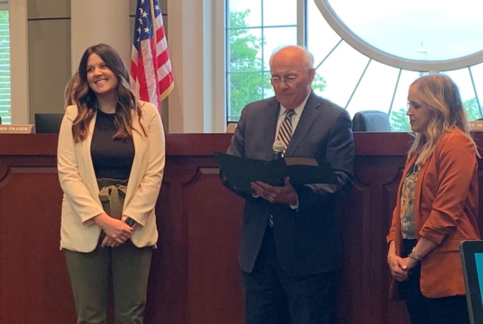 <strong>Mayor Stan Joyner reads a proclamation for infertility awareness week in between Lauren Brown&nbsp;(left) and Mollie Walker (right). Brown and Walker founded Tennessee Fertility Advocates. </strong>(Abigail Warren/The Daily Memphian)