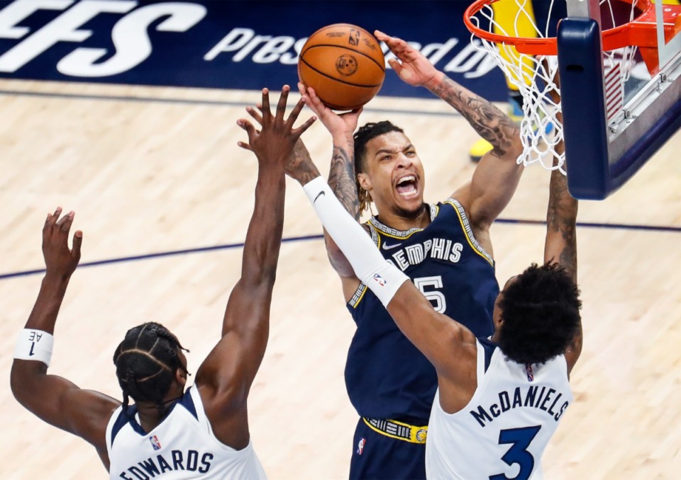 <strong>&ldquo;The crowd did a really good job of being loud when we went on that run in the fourth,&rdquo;&nbsp;said Grizzlies forward Brandon Clarke (top) &ldquo;and we could definitely feel the energy change.&rdquo;</strong>&nbsp;(Mark Weber/The Daily Memphian)