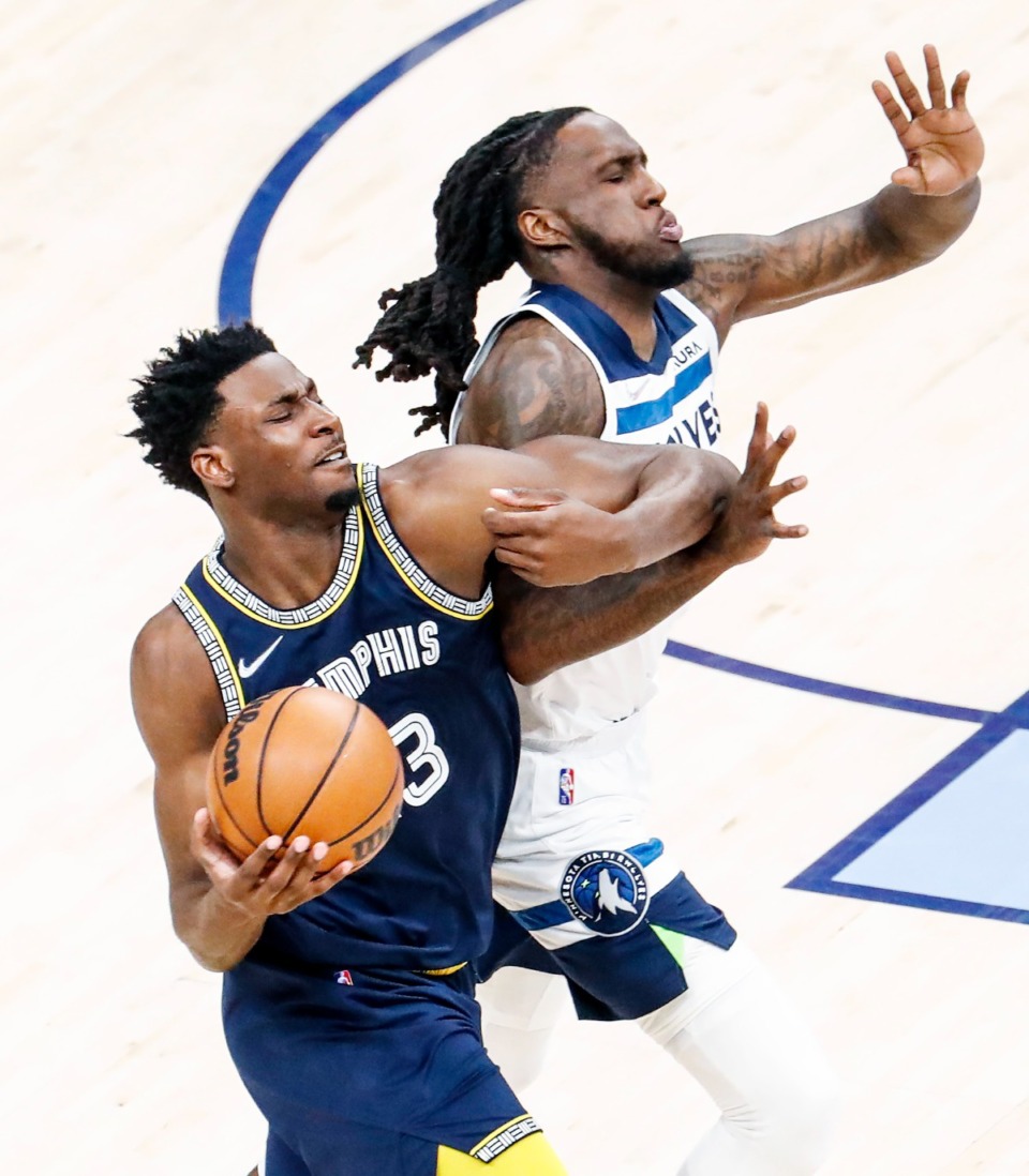 <strong>Memphis Grizzlies center Jaren Jackson Jr. (left) gets tangled up with Minnesota&rsquo;s Taurean Prince (right)&nbsp;on Tuesday, April 26, 2022, at FedExForum.</strong> (Mark Weber/The Daily Memphian)