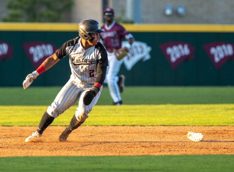 <strong>Houston second baseman Robinson Martin runs out of his shoe after rounding second base in the game against Collierville on Tuesday, April 26, 2022.</strong> (Greg Campbell/Special to The Daily Memphian).