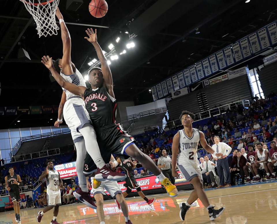 <strong>Wooddale's Alvin Miles draws a foul during Wooddale's TSSAA Class AA state basketball finals game against Knoxville Fulton at MTSU in Murfreesboro on March 16, 2019.</strong> (Jim Weber/Daily Memphian)