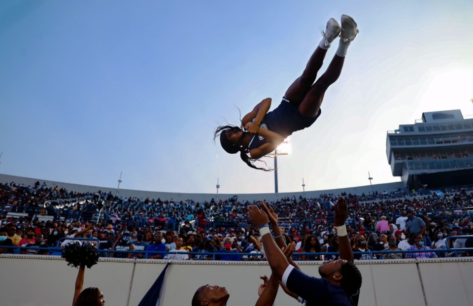 <strong>Jackson State cheerleader Essence Rentie gets tossed up in the air before the Southern Heritage Classic in Memphis, Tennessee Sept. 11, 2021. JSU announced in Febuary 2022 that the school would be leaving the Southern Heritage Classic.</strong> (Patrick Lantrip/The Daily Memphian file)