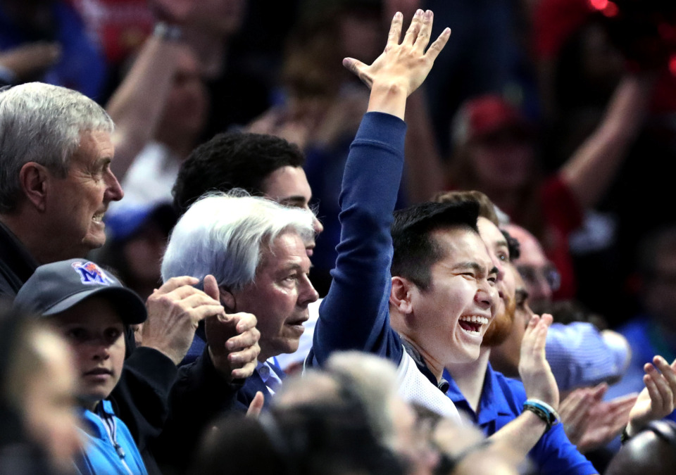 <strong>University of Memphis fans cheer on their team after the Tigers make a 3-point shot&nbsp;</strong><span class="s1"><strong>during a semifinal game&nbsp;against Houston in the American Athletic Conference tournament on Saturday, March 16, 2019. </strong>(Houston Cofield/Daily Memphian)</span>
