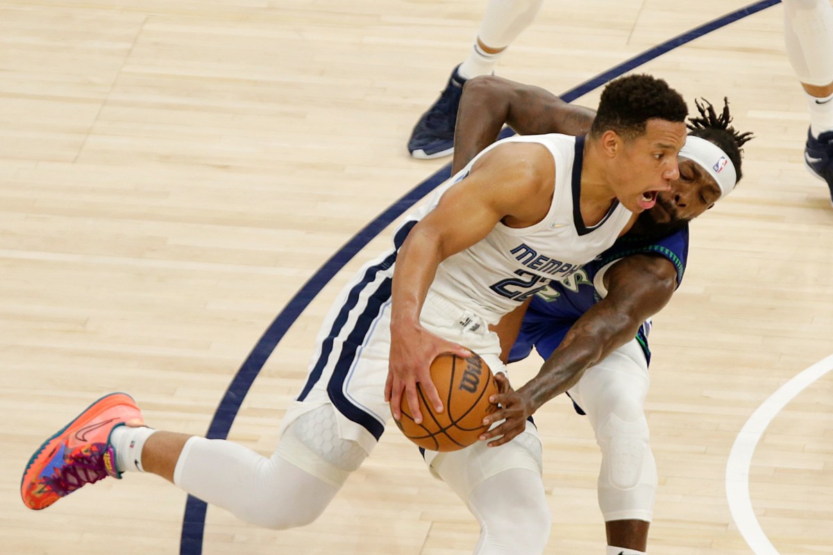 <strong>Memphis Grizzlies guard Desmond Bane, left, is fouled by Minnesota guard Patrick Beverley, right, on April 29, 2022, in Minneapolis.</strong> (Andy Clayton-King/AP)