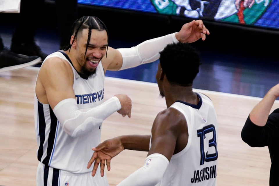 <strong>Memphis Grizzlies forward Dillon Brooks (24) celebrates with forward Jaren Jackson Jr. (13) after the Grizzlies close out the Minnesota Timberwolves in Game 6 of the first-round playoff series on April 29, 2022, in Minneapolis.</strong> (Andy Clayton-King/AP)