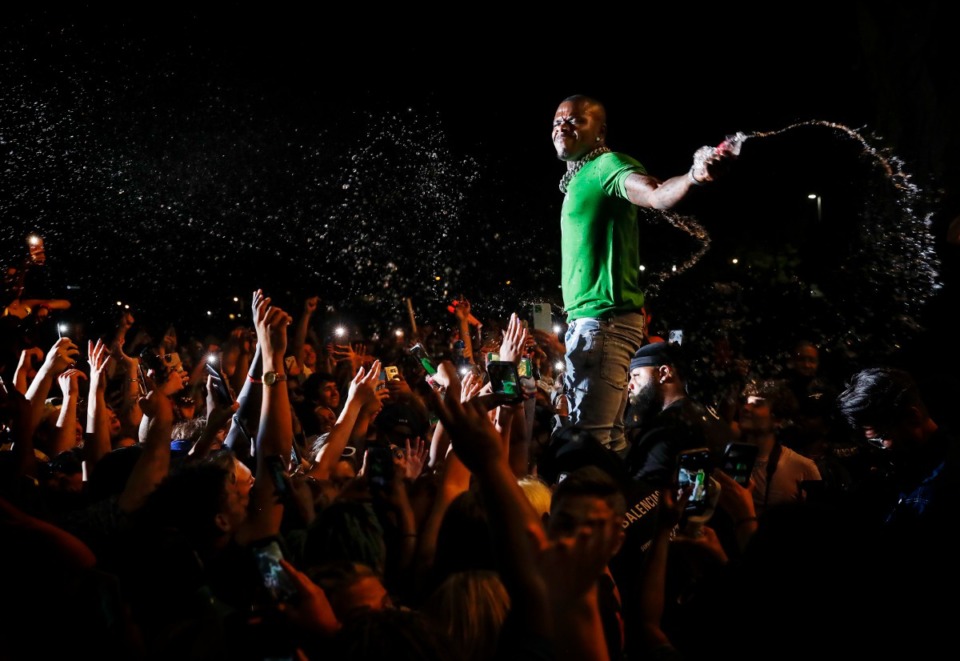 <strong>DaBaby sprays the crowd while performing during the first day of Beale Street Music Fest on Friday, April 29, 2022 at Liberty Park.</strong> (Mark Weber/The Daily Memphian)
